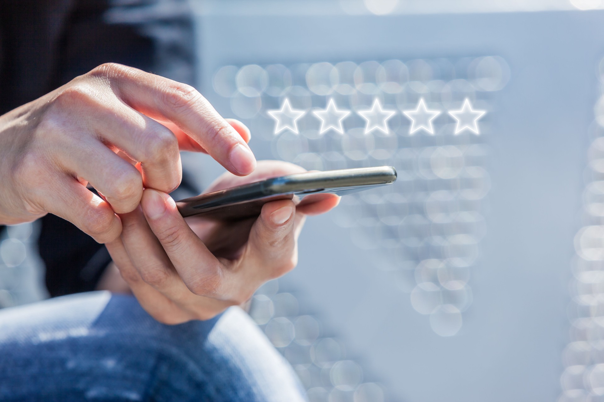 Customer Service Experience Performance Analysis. Close-up of Woman's Hand Holding a Smart Phone with Icon Five Star Symbol to Increase Rating of Company